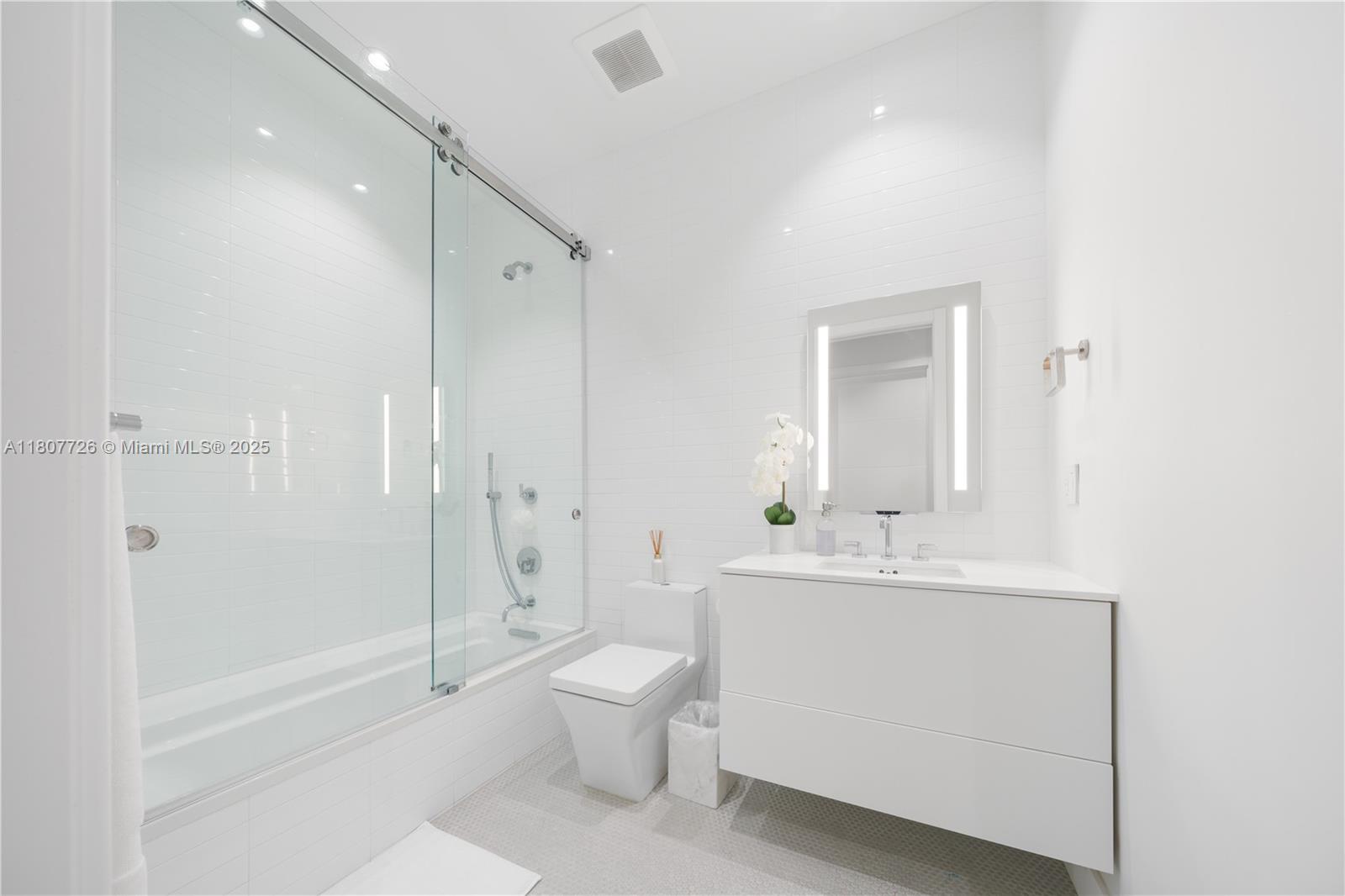 9450 Southwest 98th Street Miami, FL 33176 - Photo 51 of 66 a bathroom with a sink toilet and shower