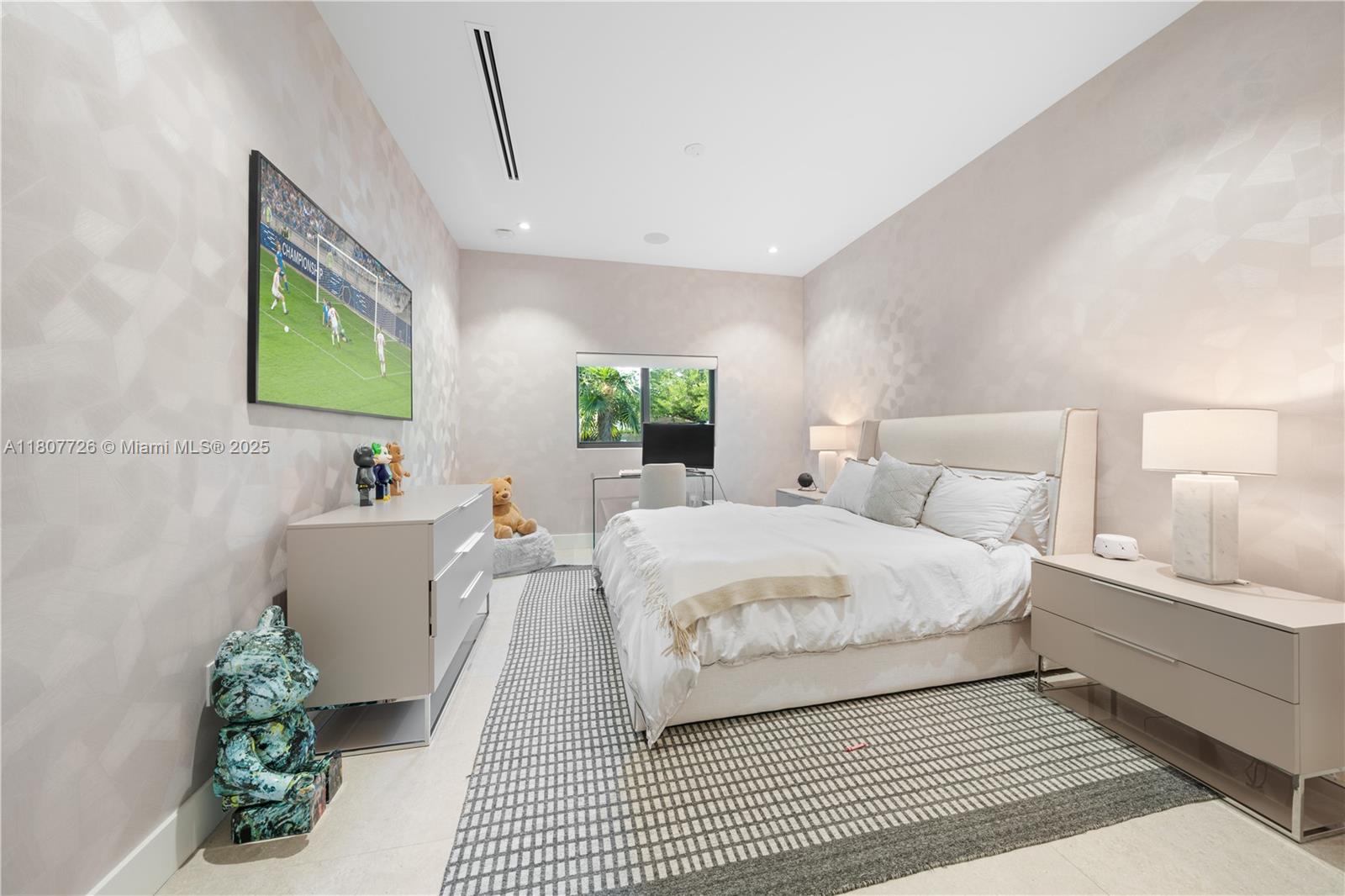 9450 Southwest 98th Street Miami, FL 33176 - Photo 54 of 66 a spacious bedroom with a bed and a couch