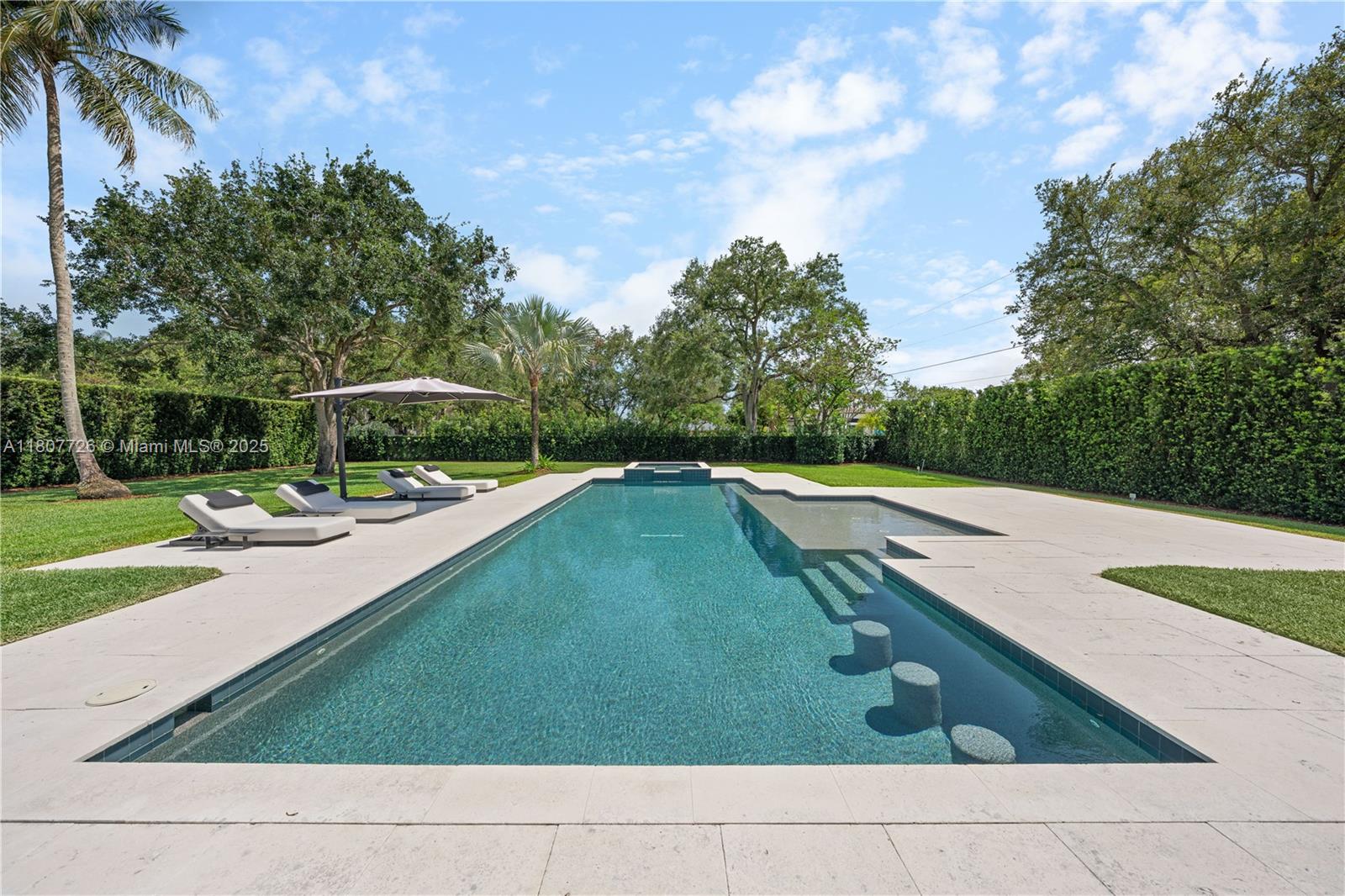 9450 Southwest 98th Street Miami, FL 33176 - Photo 61 of 66 a view of a yard with a patio