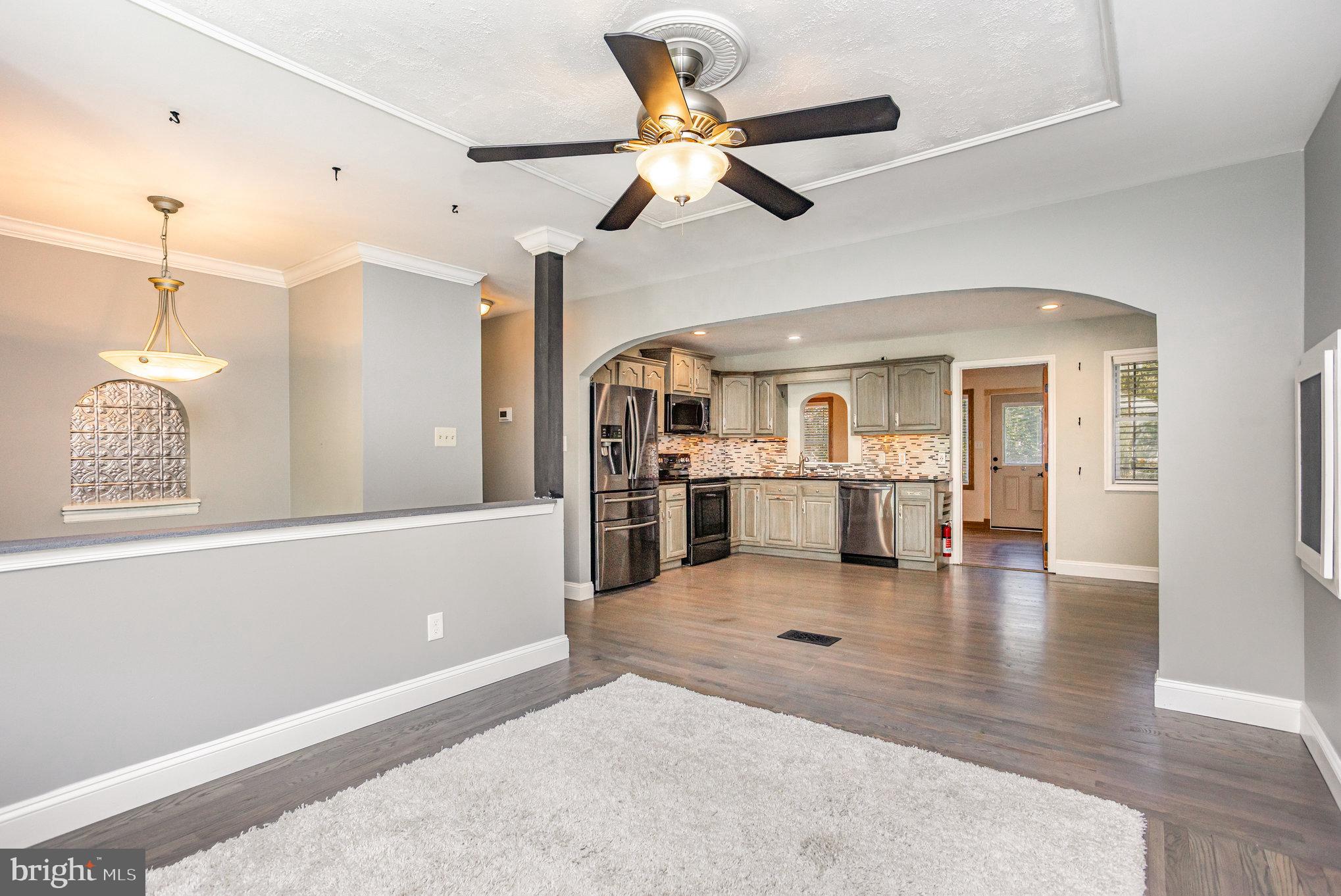 5 Kings Court Elkton, MD 21921 - Photo 34 of 34 a view of a living room and a ceiling fan with kitchen view