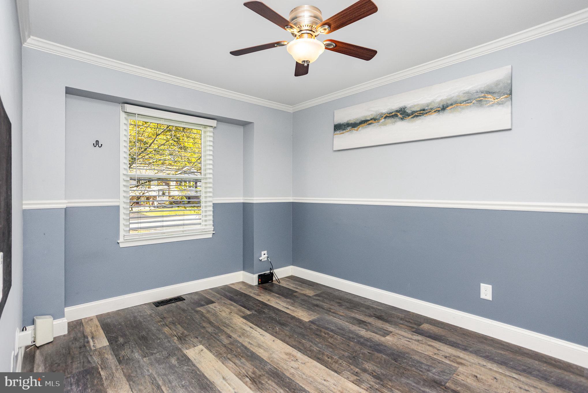 5 Kings Court Elkton, MD 21921 - Photo 12 of 34 a view of empty room with window and ceiling fan
