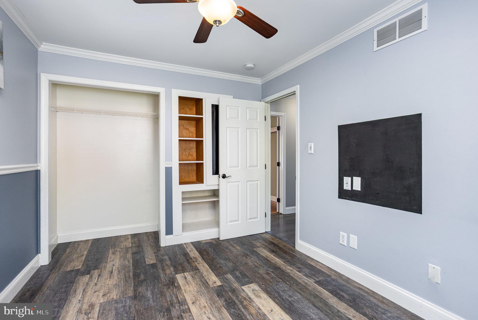 5 Kings Court Elkton, MD 21921 - Photo 13 of 34 a view of a livingroom with wooden floor and ceiling fan