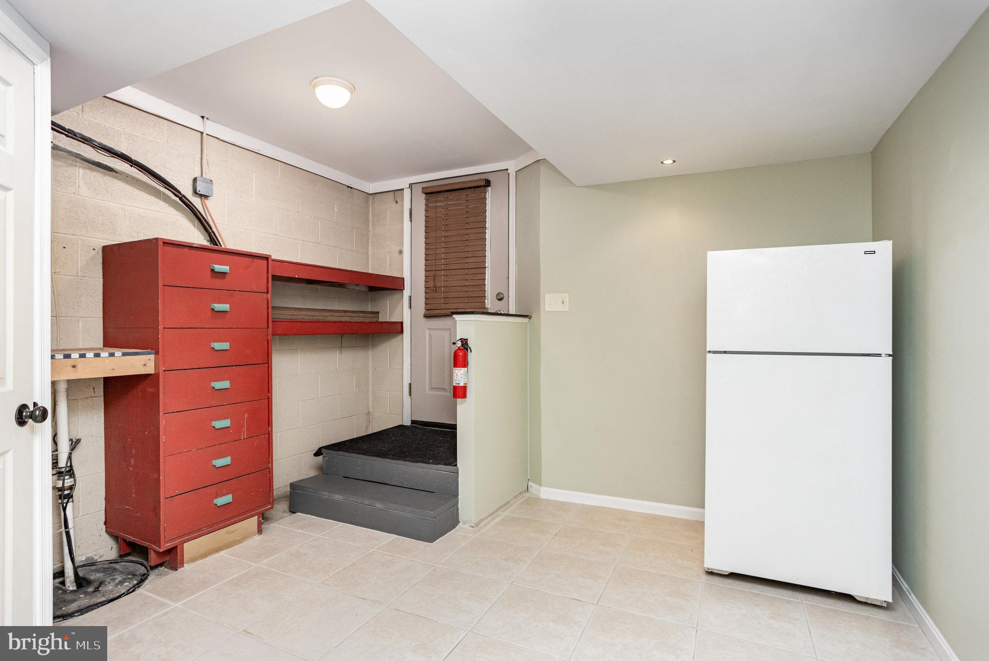 5 Kings Court Elkton, MD 21921 - Photo 23 of 34 a utility room with cabinets washer and dryer