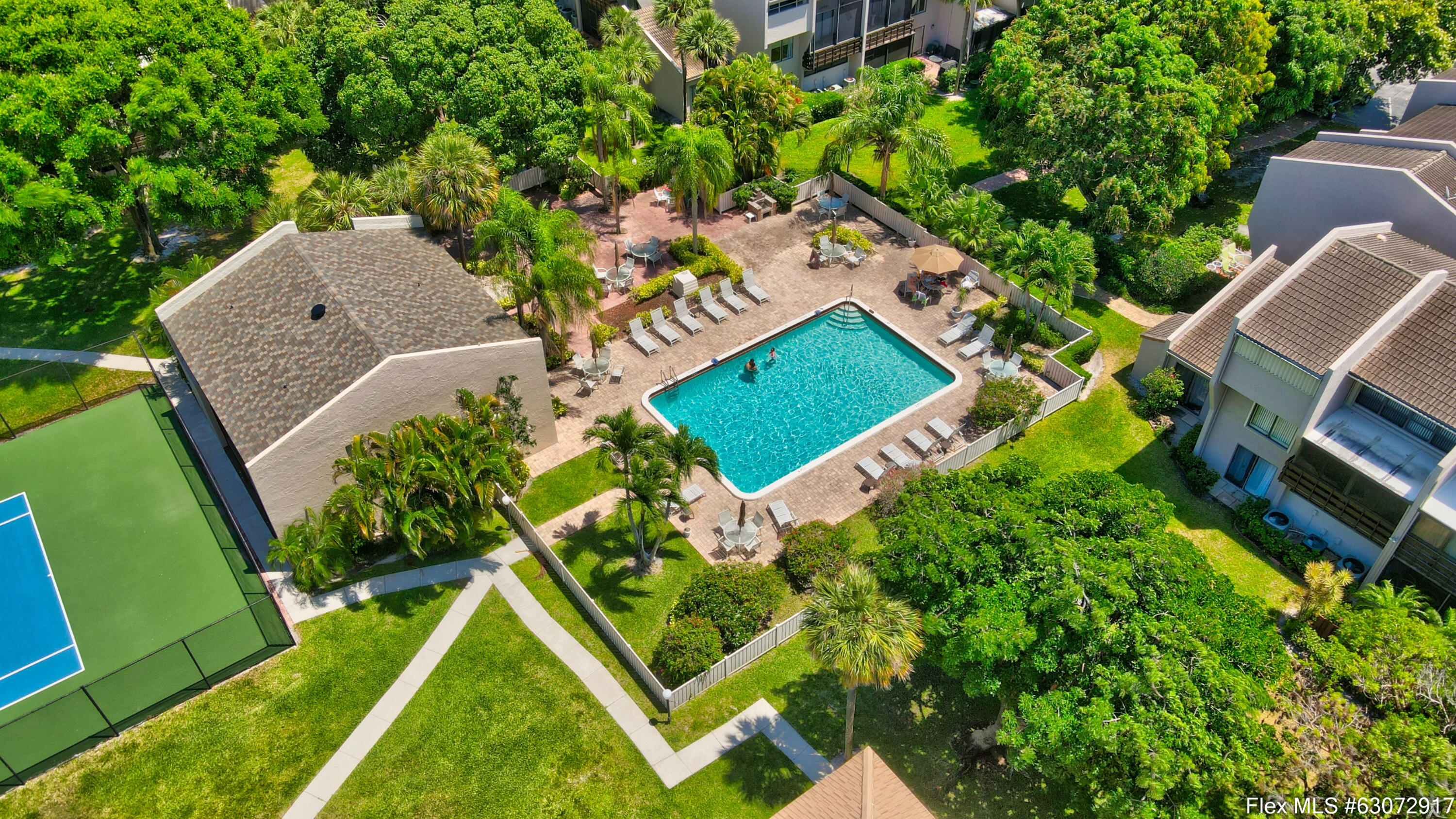159 Northwest 70th Street, Unit 406 Boca Raton, FL 33487 - Photo 36 of 40 Tennis Court/Clubhouse/Pool