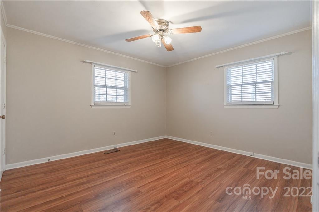 2070 John Everall Road Lancaster, SC 29720 - Photo 12 of 27 wooden floor in an empty room with a window