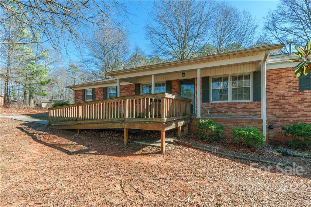 2070 John Everall Road Lancaster, SC 29720 - Photo 2 of 27 a view of a house with a yard and deck