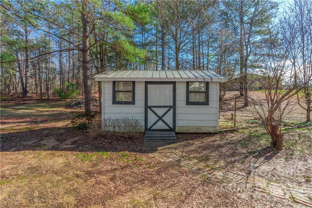 2070 John Everall Road Lancaster, SC 29720 - Photo 24 of 27 a view of a house with a yard