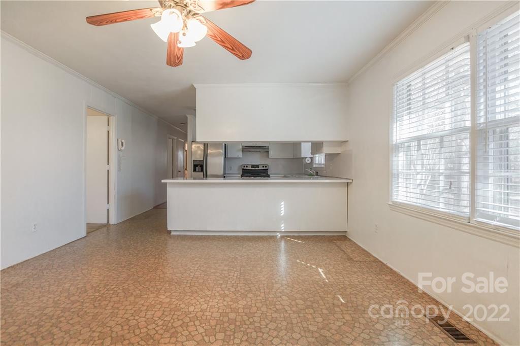 2070 John Everall Road Lancaster, SC 29720 - Photo 6 of 27 a view of a kitchen with a sink stainless steel appliances and cabinets