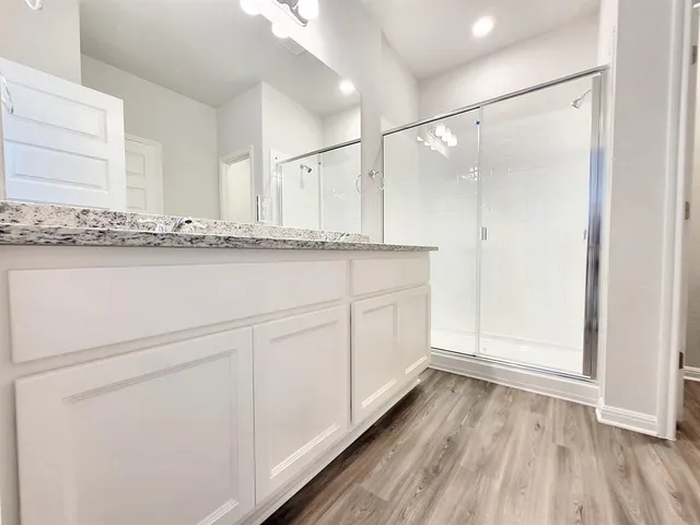 a bathroom view of a toilet and a window
