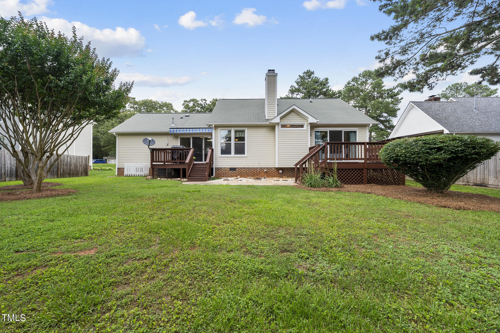 1609 Forest Road Wake Forest, NC 27587 - Photo 17 of 22 a front view of a house with garden