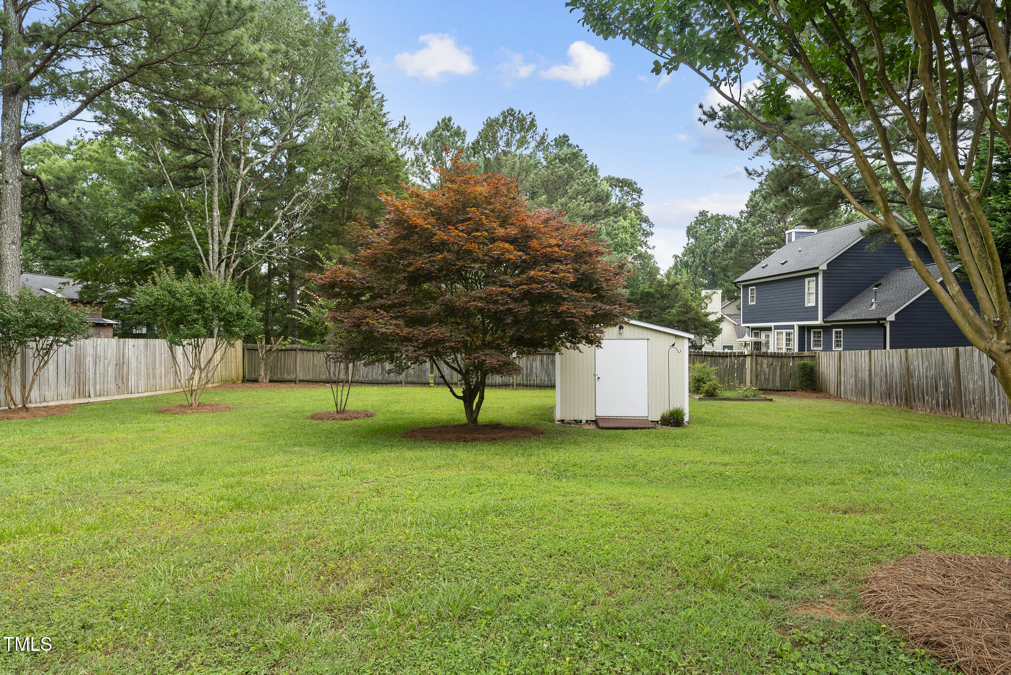 1609 Forest Road Wake Forest, NC 27587 - Photo 21 of 22 a view of a house with a yard