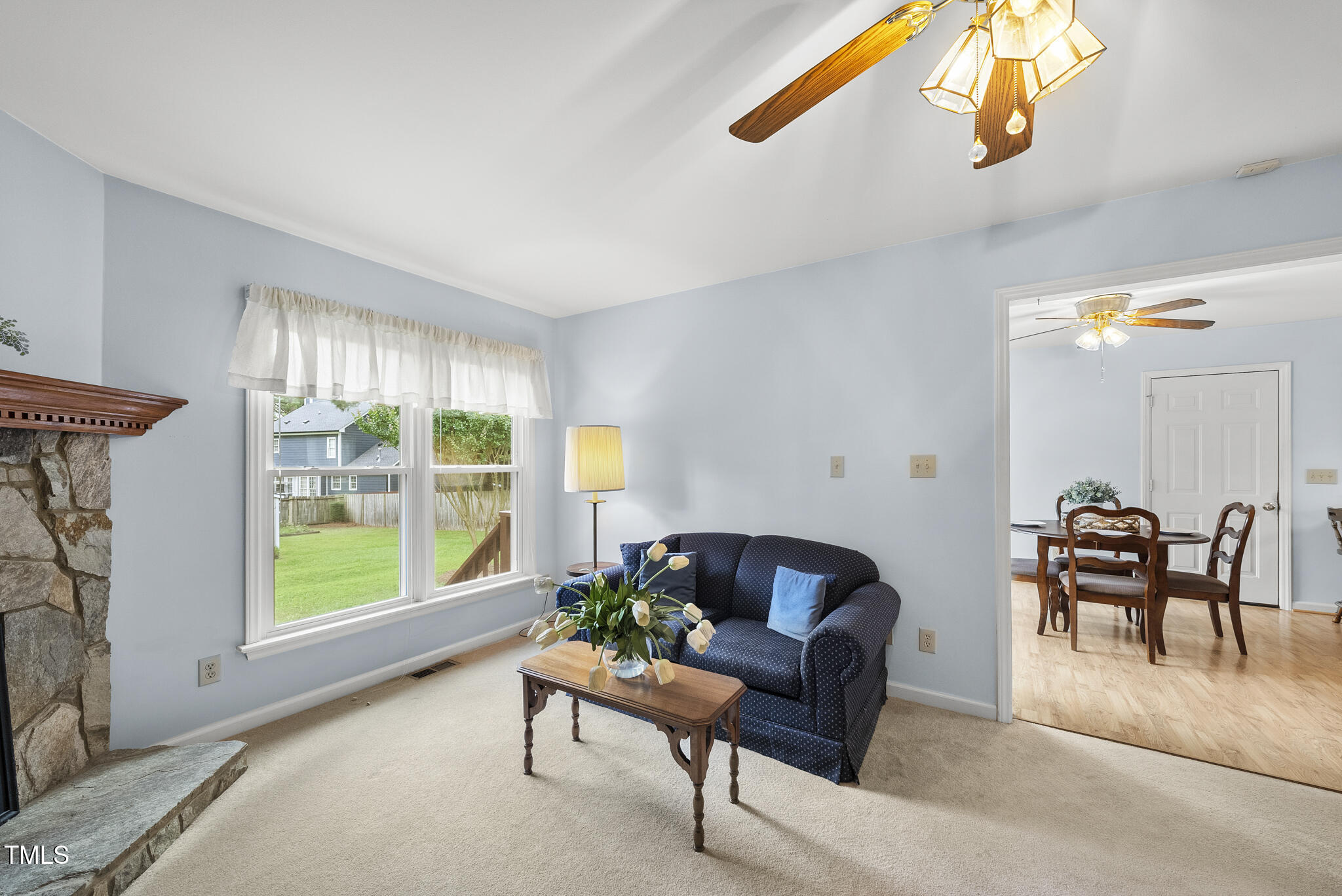 1609 Forest Road Wake Forest, NC 27587 - Photo 8 of 22 a living room with furniture and a window