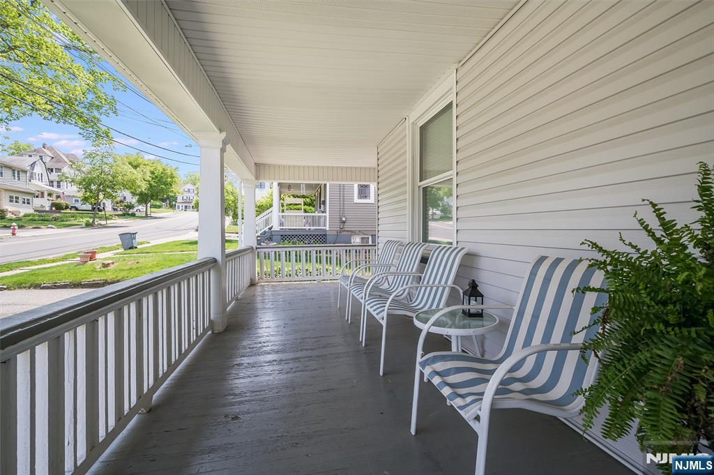 14 Ravine Avenue, Unit 2 Caldwell, NJ 07006 - Photo 2 of 23 a view of balcony with two chairs and table in patio
