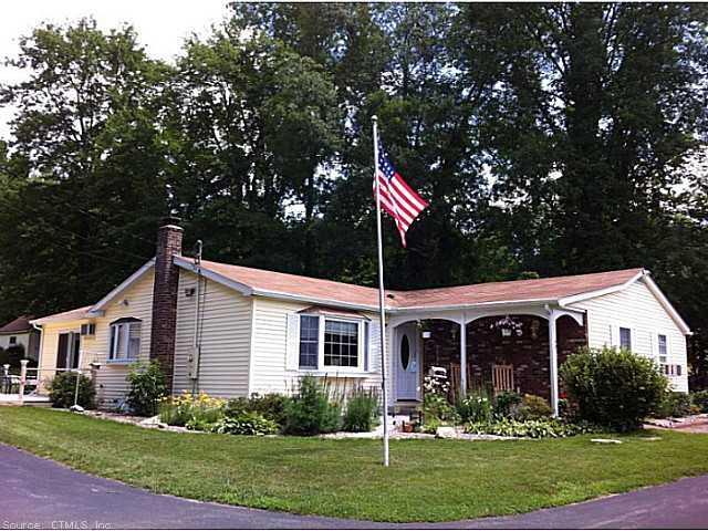 60 Cemetery Road Scotland, CT 06330 - Photo 1 of 1 a front view of a house with garden