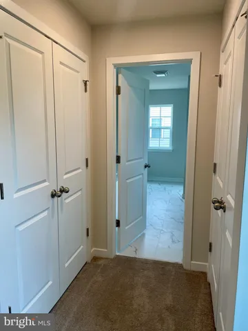 a bathroom with a tub and shower