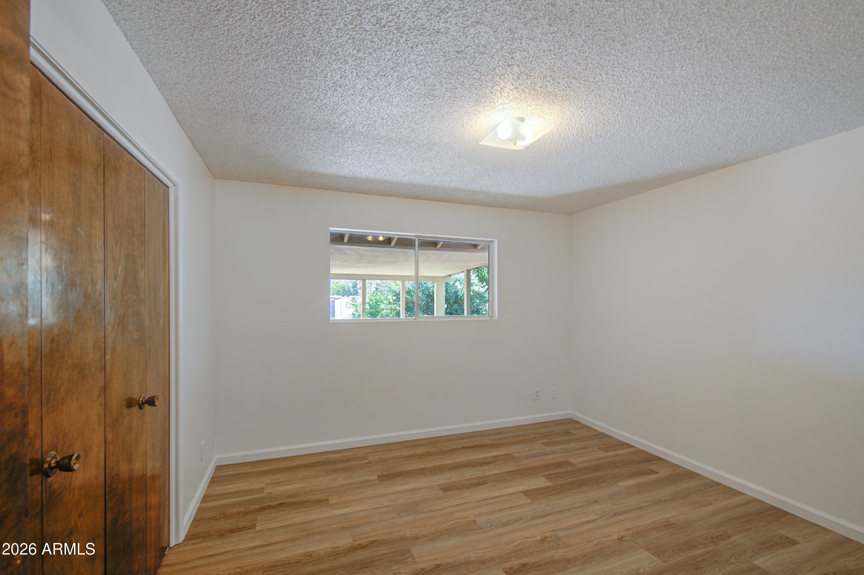 650 North Rennick Drive Apache Junction, AZ 85120 - Photo 6 of 36 Bedroom 2-pic 1