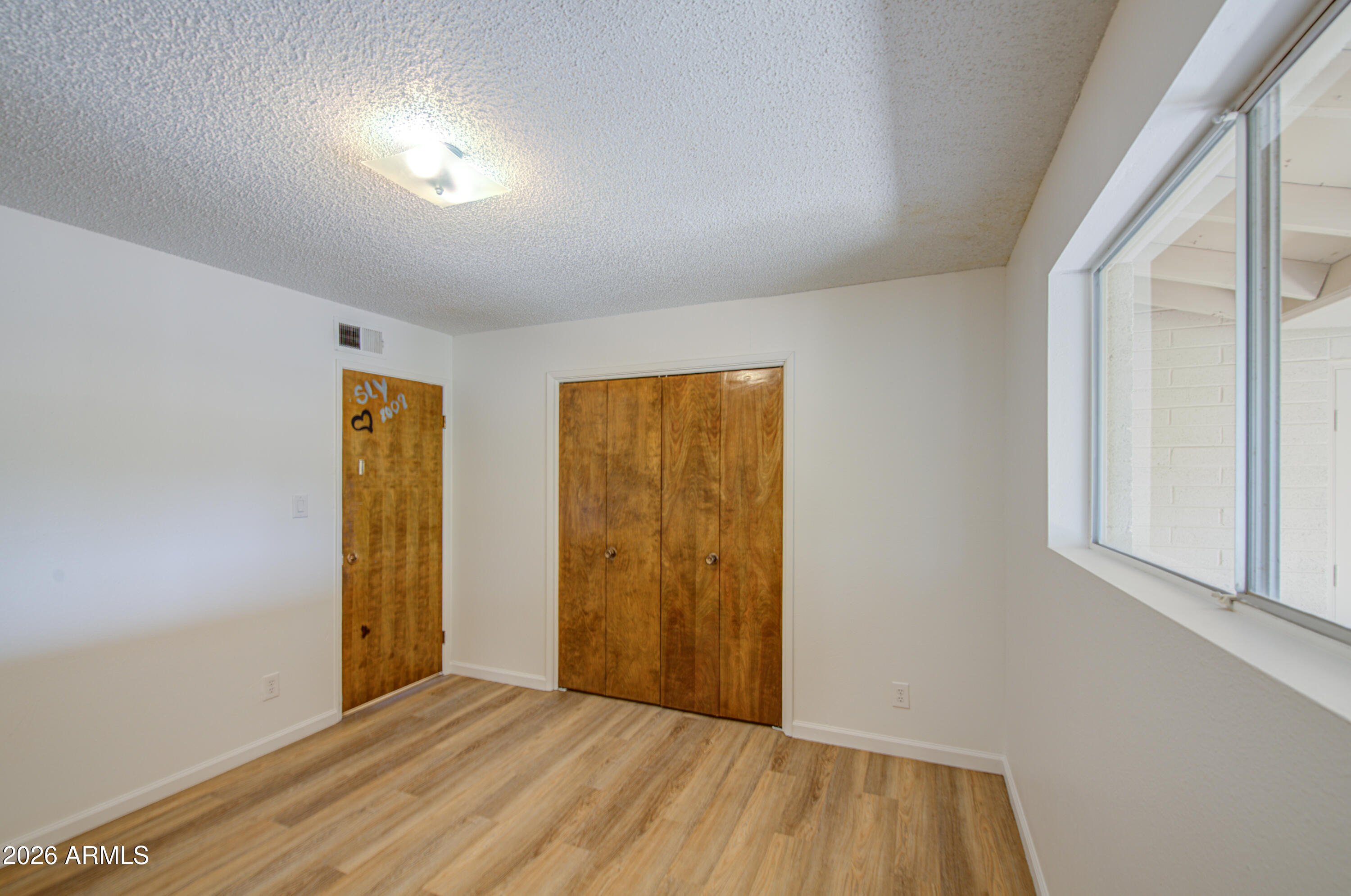 650 North Rennick Drive Apache Junction, AZ 85120 - Photo 7 of 36 Bedroom 2-pic 2