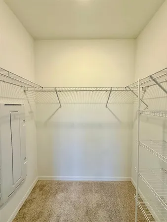 a view of a room with racks on the wall