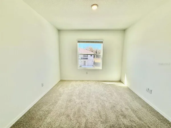 an empty room with a natural light