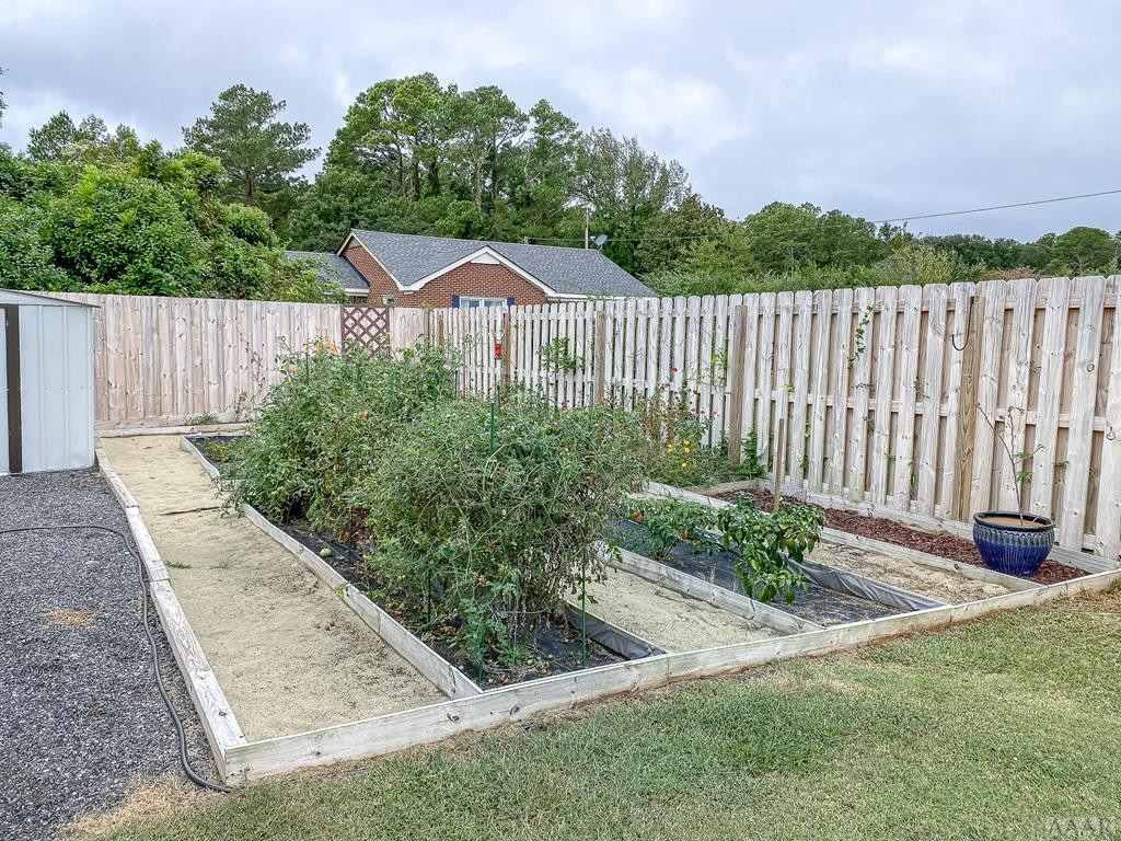 1121 Waterlily Road Coinjock, NC 27923 - Photo 22 of 27 Room for a Garden!