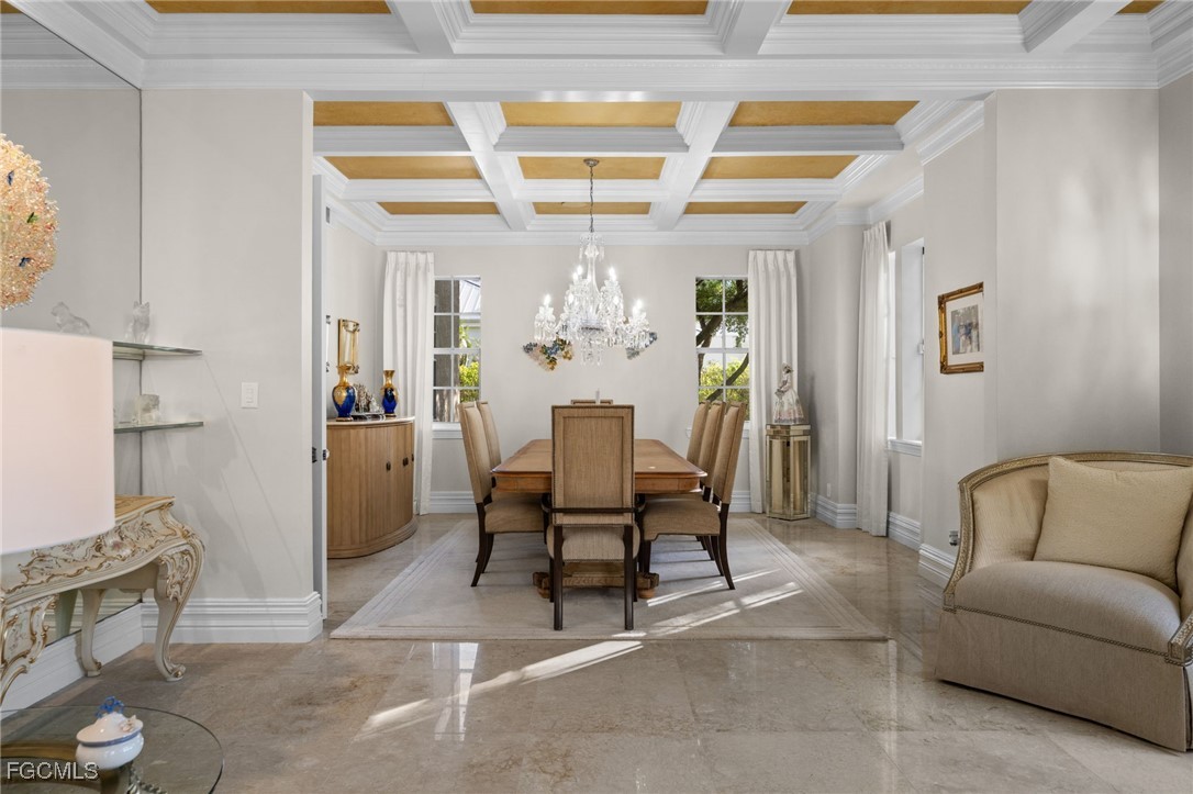 9250 The Lane Naples, FL 34109 - Photo 16 of 50 a view of a livingroom with furniture and a dining table