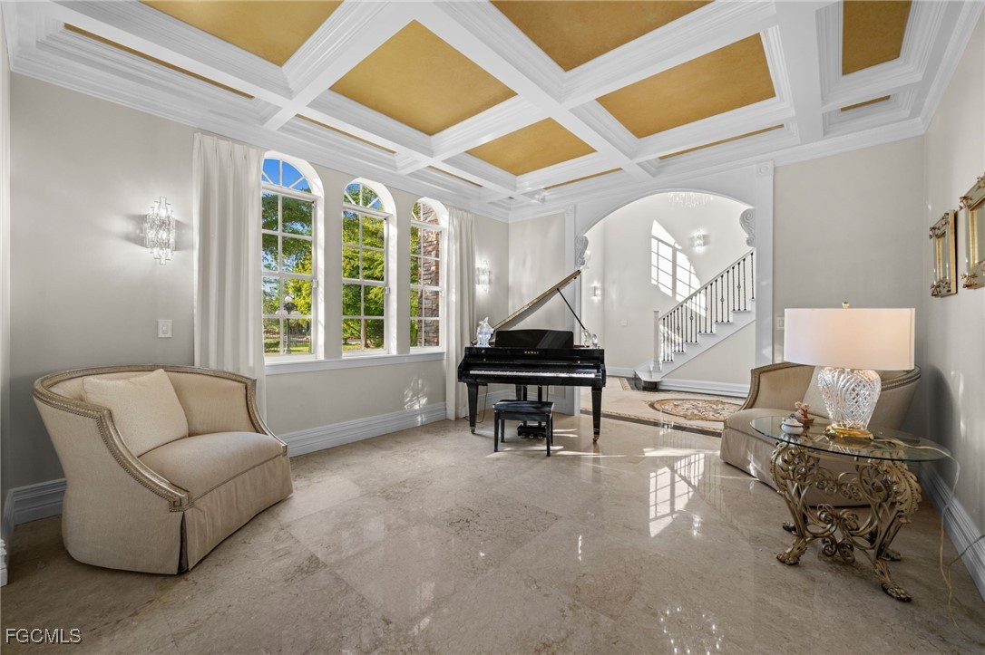 9250 The Lane Naples, FL 34109 - Photo 18 of 50 a living room with furniture and a piano