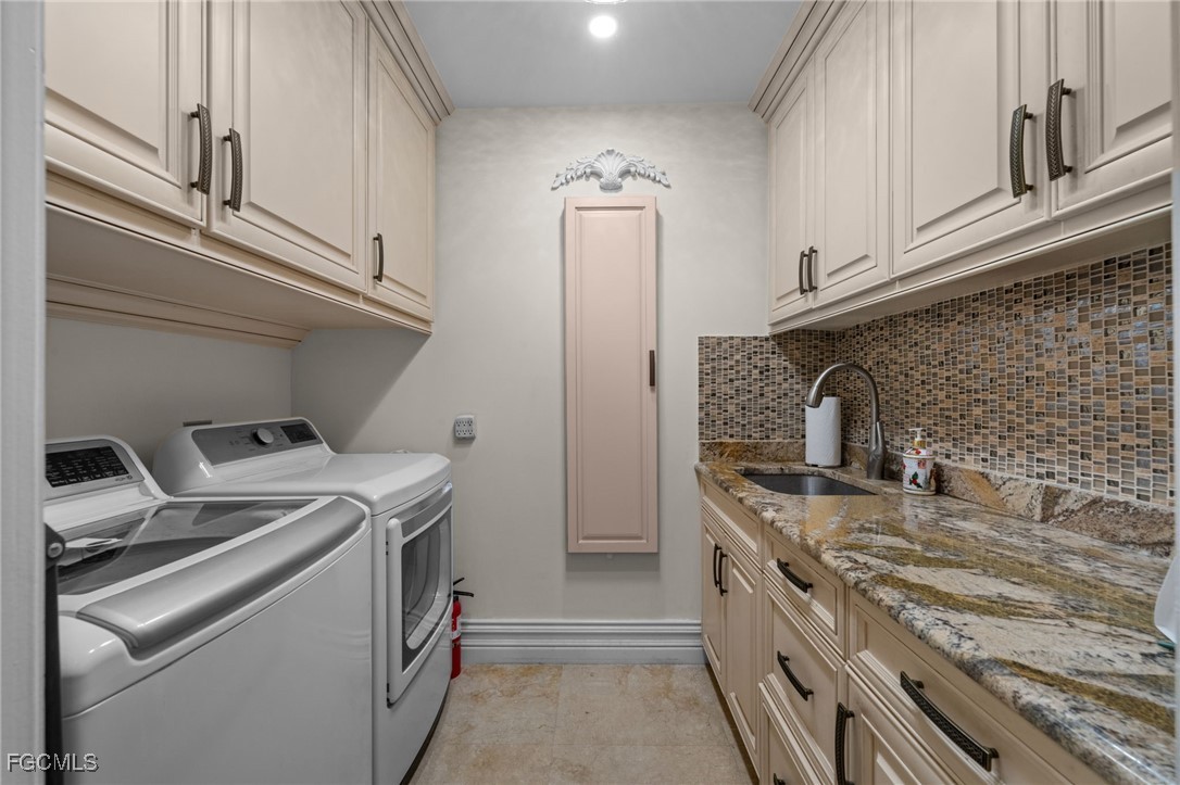 9250 The Lane Naples, FL 34109 - Photo 44 of 50 a kitchen with a stove and a refrigerator