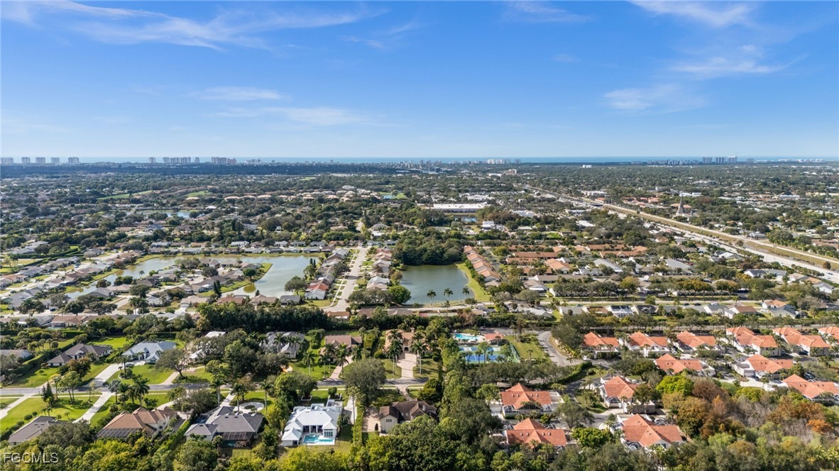 9250 The Lane Naples, FL 34109 - Photo 47 of 50 an aerial view of multiple house
