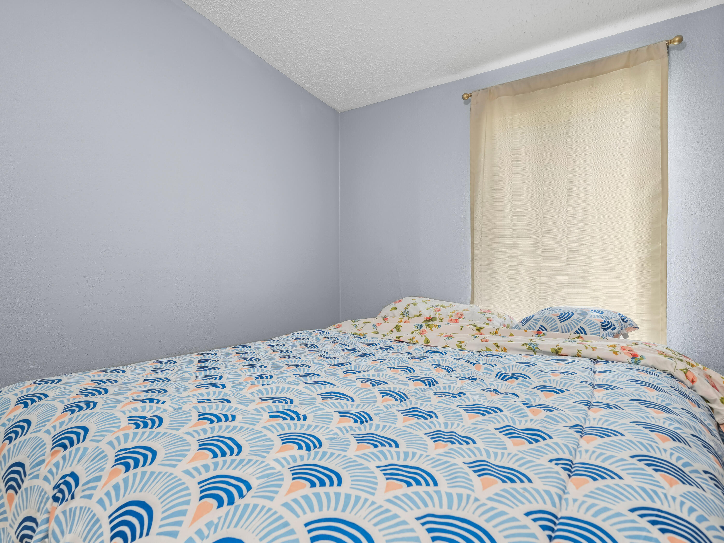 329 Kilpatrick Loop Clewiston, FL 33440 - Photo 15 of 56 a bedroom with a bed with wooden floor