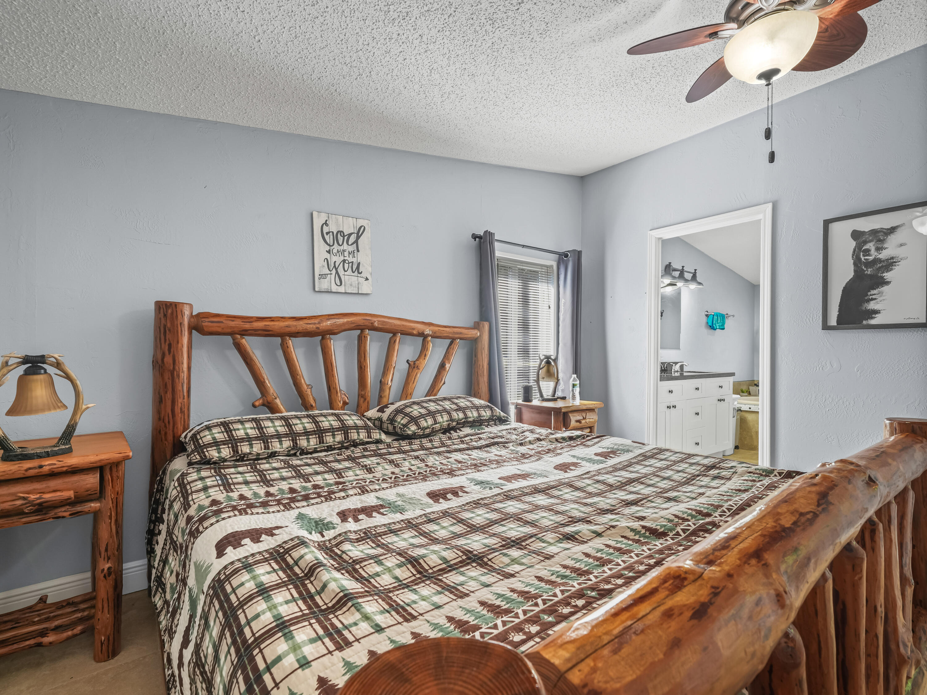 329 Kilpatrick Loop Clewiston, FL 33440 - Photo 20 of 56 a bedroom with a bed and dresser