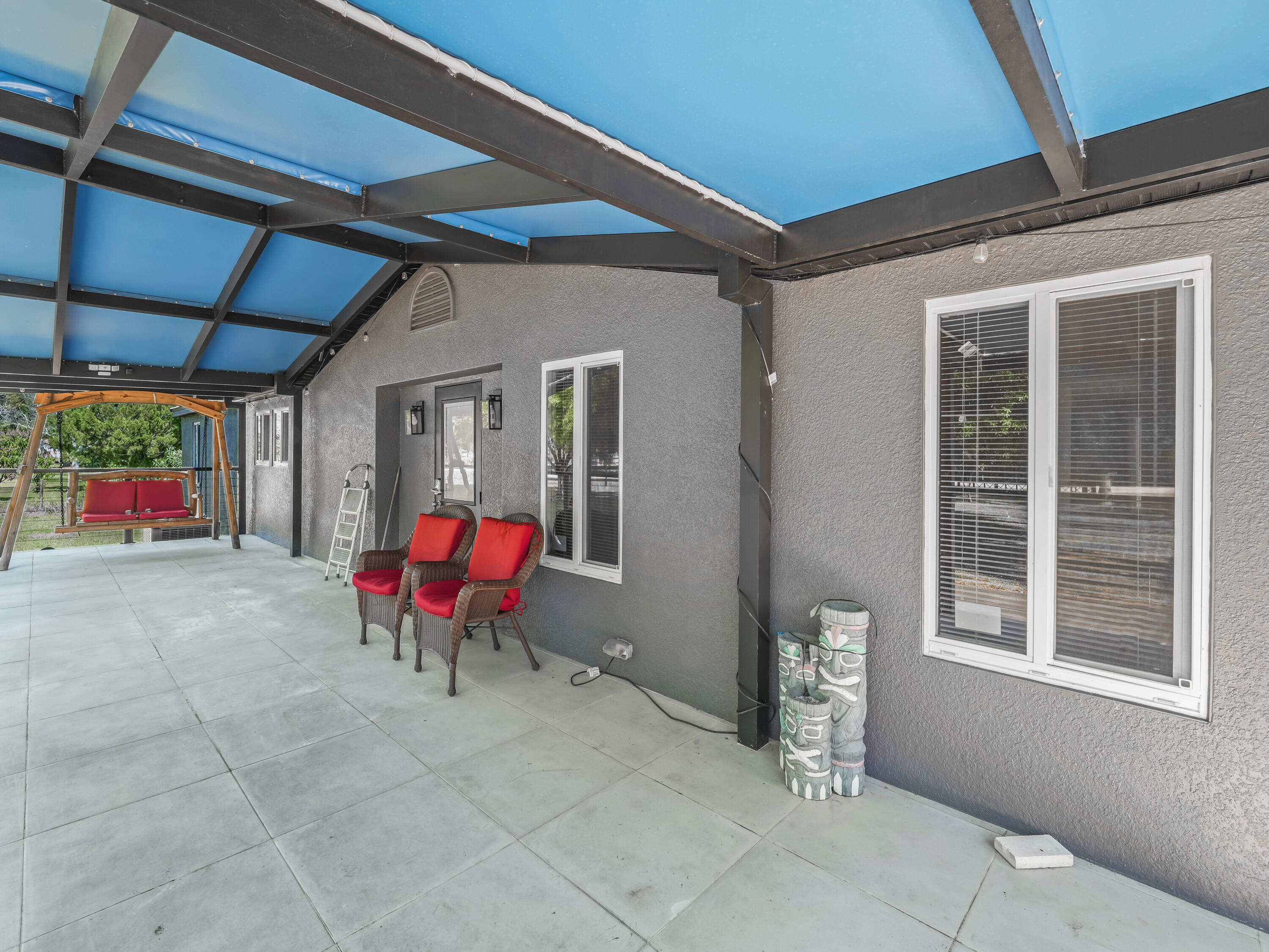 329 Kilpatrick Loop Clewiston, FL 33440 - Photo 3 of 56 a view of an outdoor space with porch