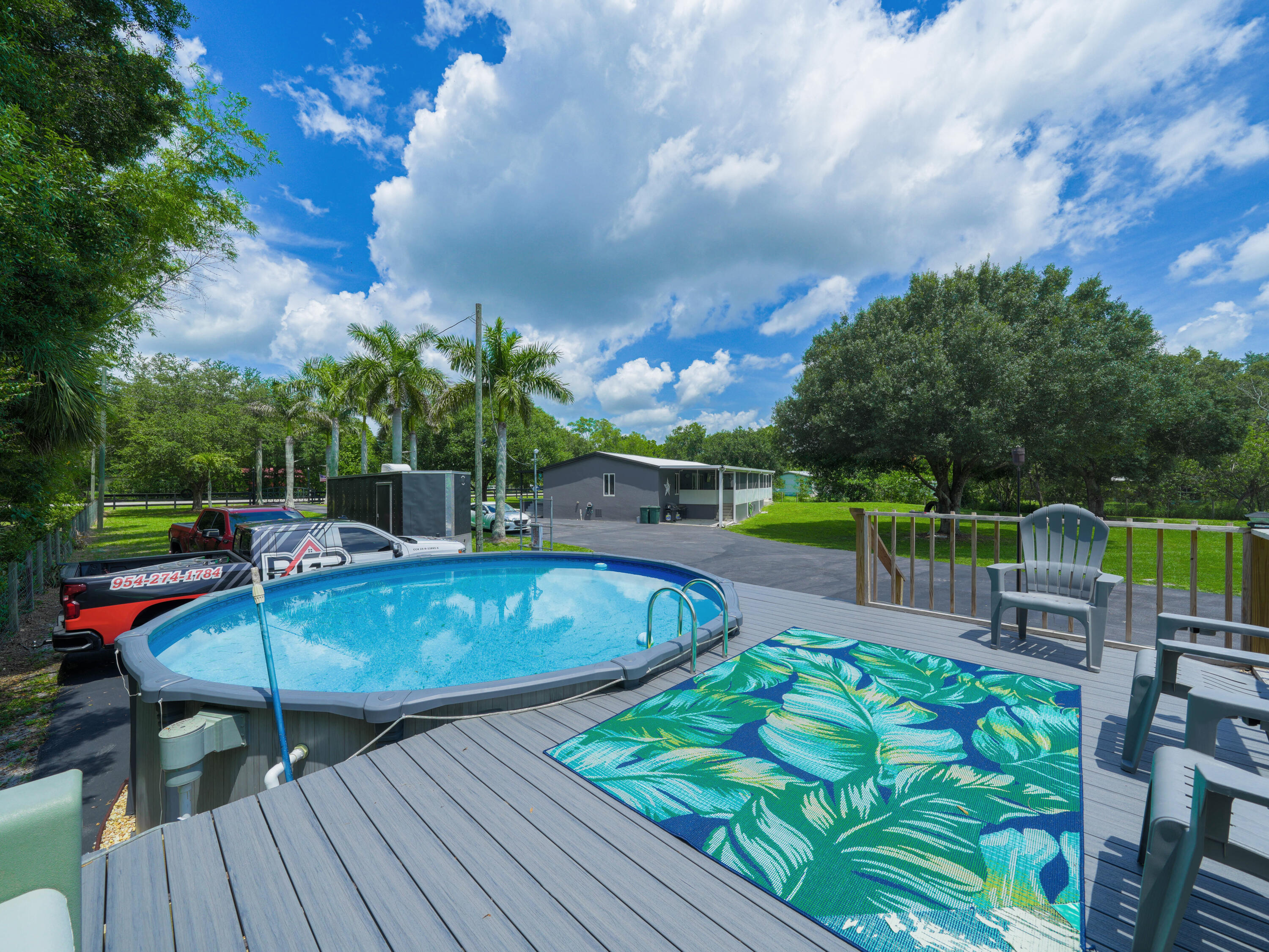 329 Kilpatrick Loop Clewiston, FL 33440 - Photo 34 of 56 a view of a chairs and table in the patio