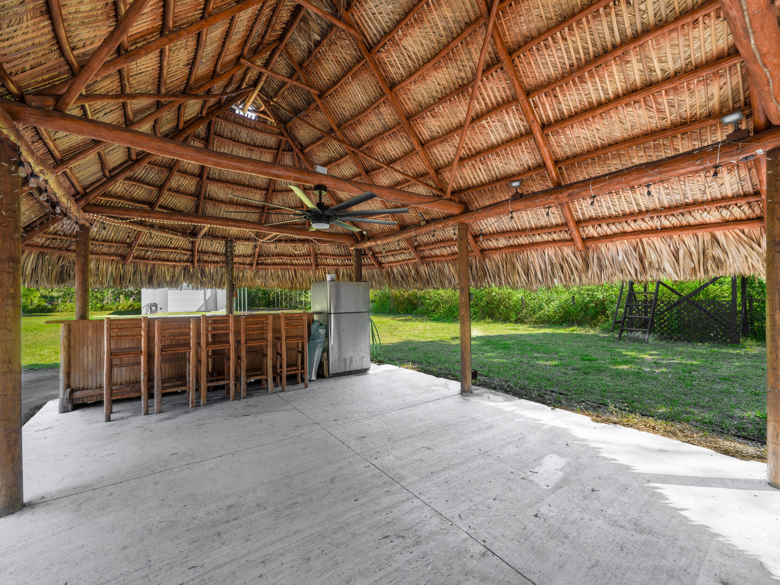 329 Kilpatrick Loop Clewiston, FL 33440 - Photo 36 of 56 a view of a backyard with wooden fence
