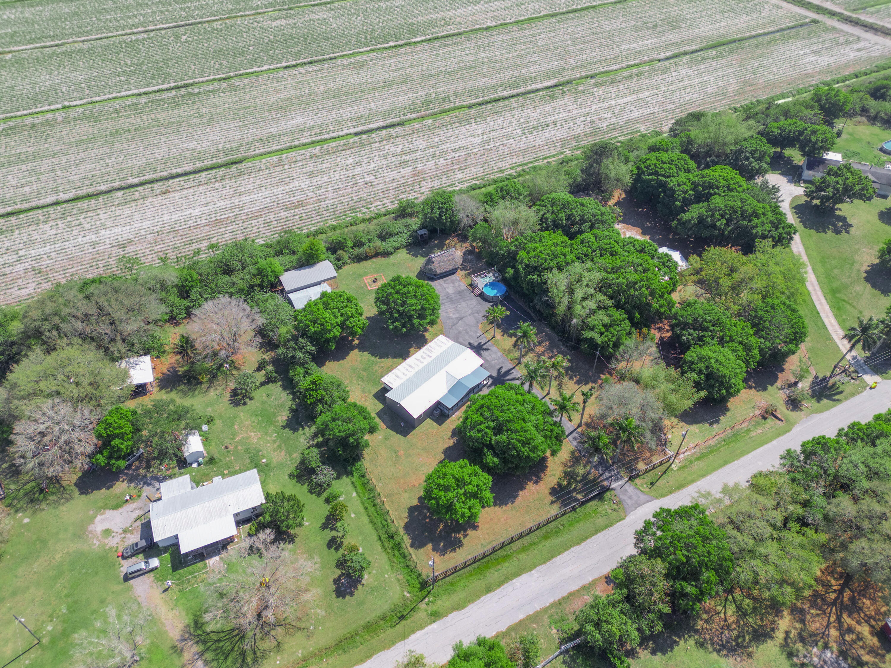 329 Kilpatrick Loop Clewiston, FL 33440 - Photo 42 of 56 an aerial view of a house with a yard