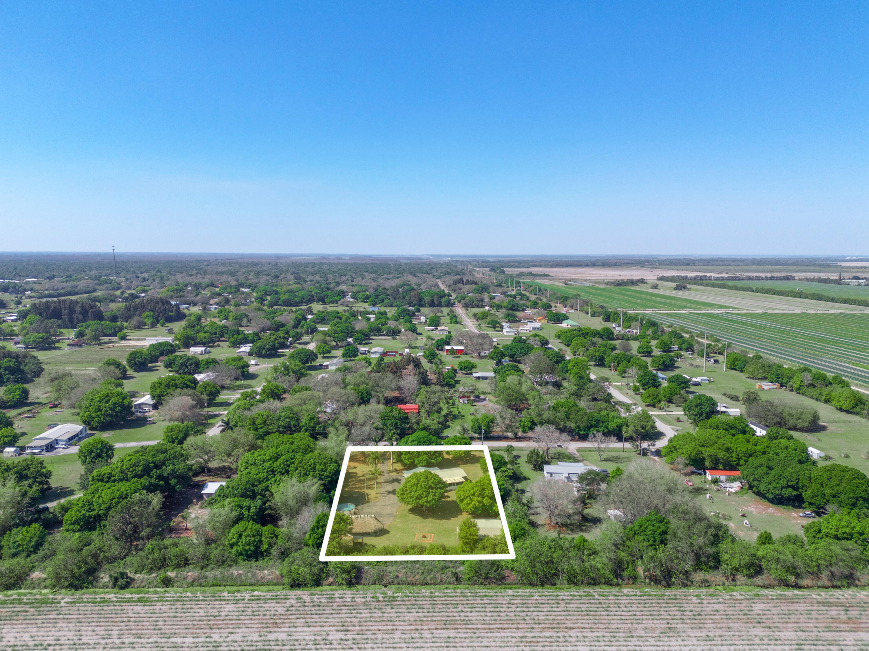 329 Kilpatrick Loop Clewiston, FL 33440 - Photo 49 of 56 an aerial view of a residential houses with outdoor space and street view