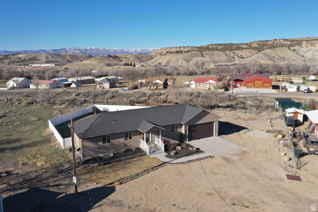 2095 West 4100 North Spring Glen, UT 84526 - Photo 31 of 35 Drone / aerial view of a mountainous background