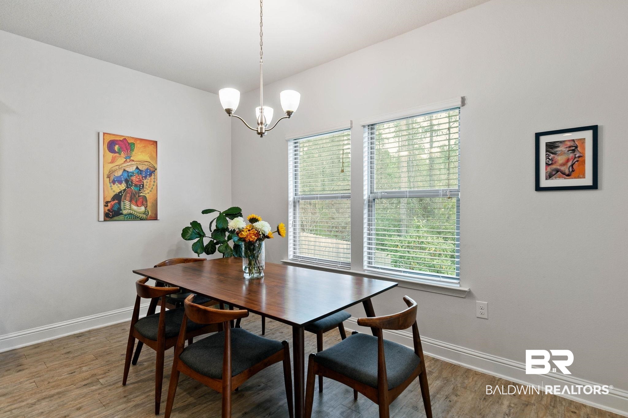 31350 Hoot Owl Road Daphne, AL 36527 - Photo 21 of 94 Dining space featuring light wood-style flooring and hanging lights