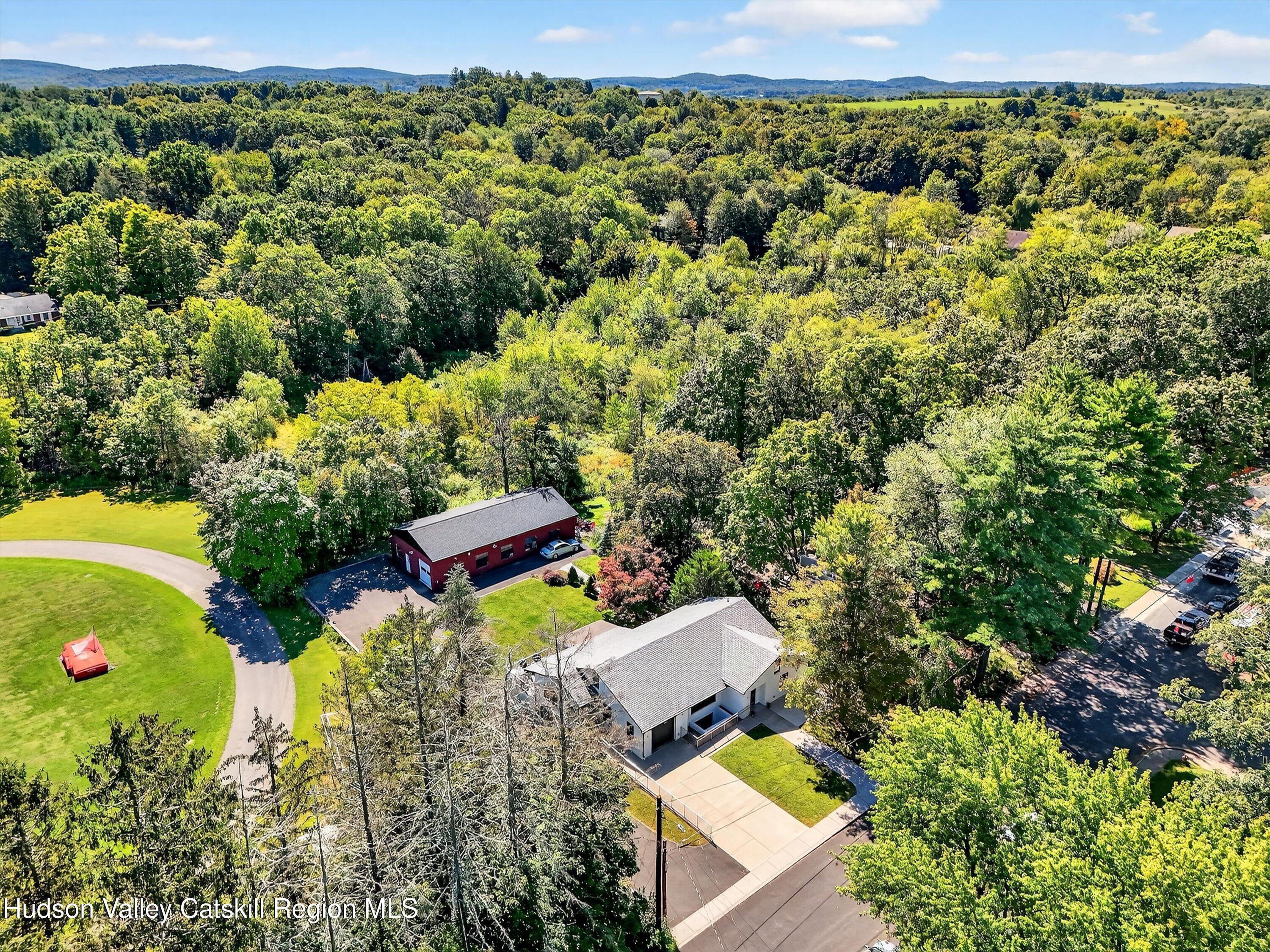 6 Hasbrouck Place New Paltz, NY 12561 - Photo 1 of 38 an aerial view of a house with a yard