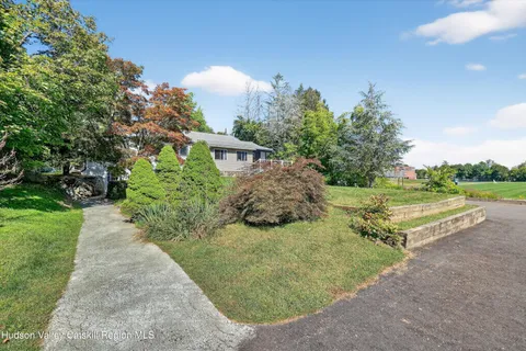a view of a backyard with a garden