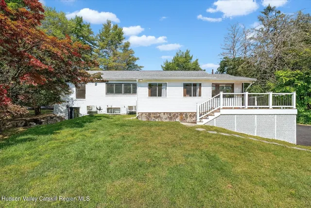 a house view with a garden space
