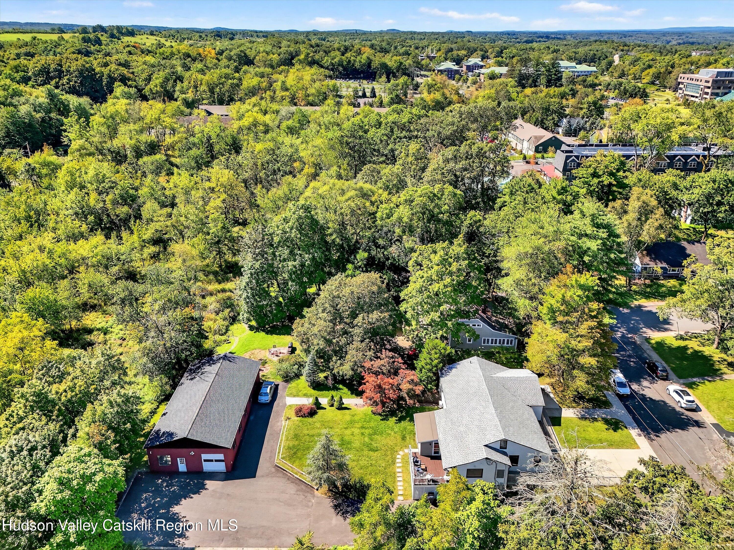 6 Hasbrouck Place New Paltz, NY 12561 - Photo 36 of 38 an aerial view of a house with yard swimming pool and outdoor seating