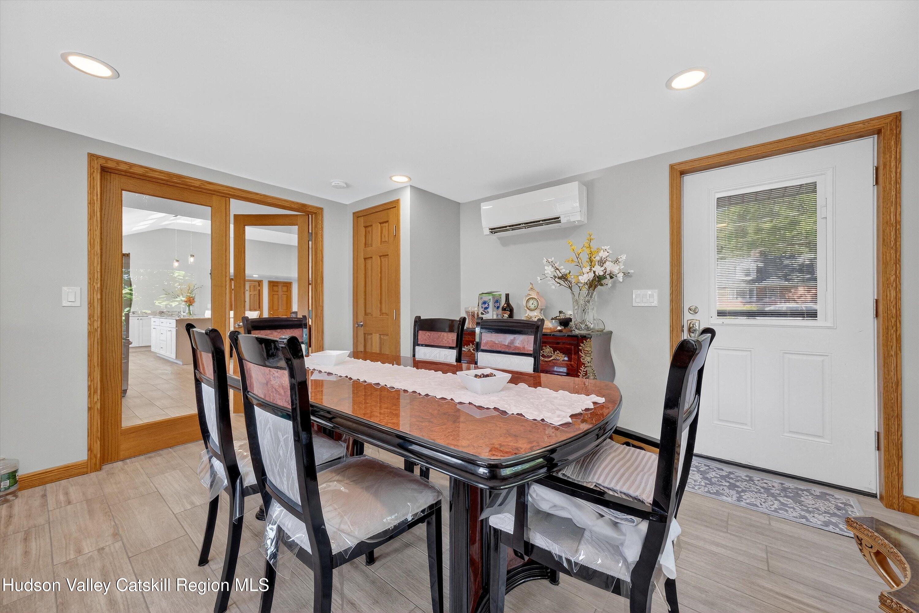 6 Hasbrouck Place New Paltz, NY 12561 - Photo 9 of 38 a view of a dining room with furniture window and wooden floor