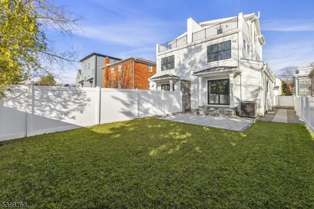 a view of a building with a yard