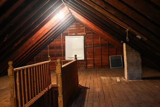 a view of balcony with wooden floor