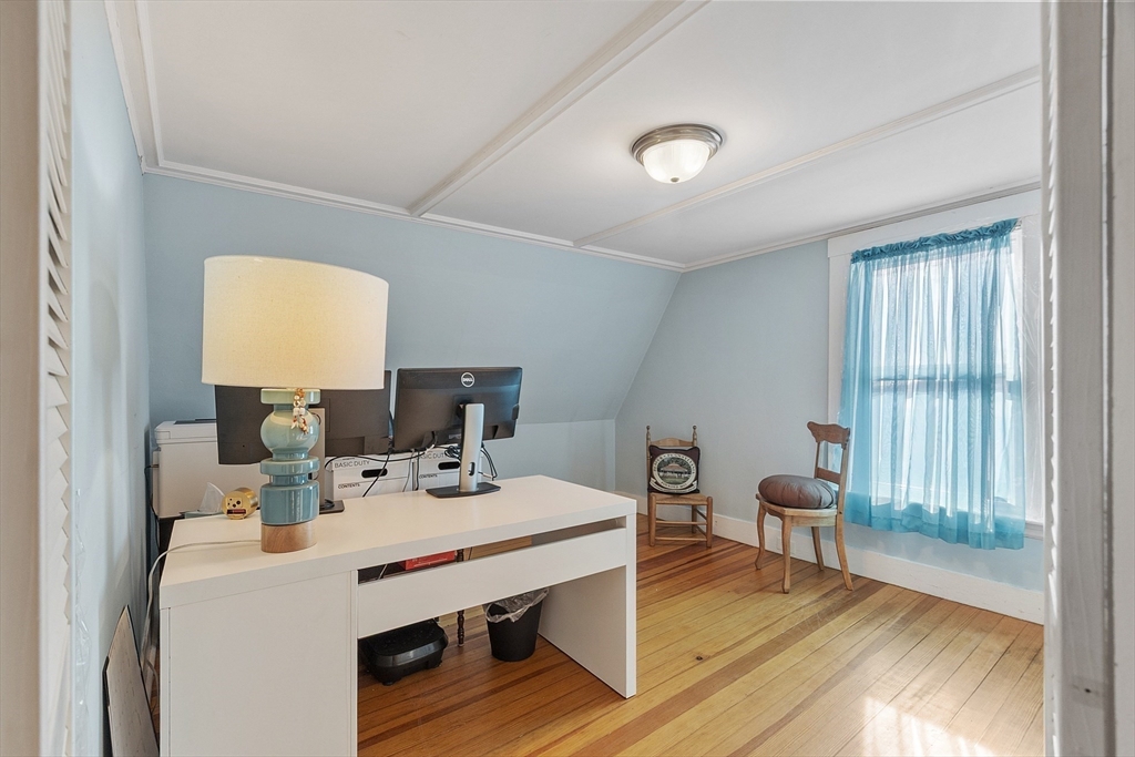 10 Oak Street, Unit 3 Gloucester, MA 01930 - Photo 20 of 24 a view of a workspace with furniture and a window