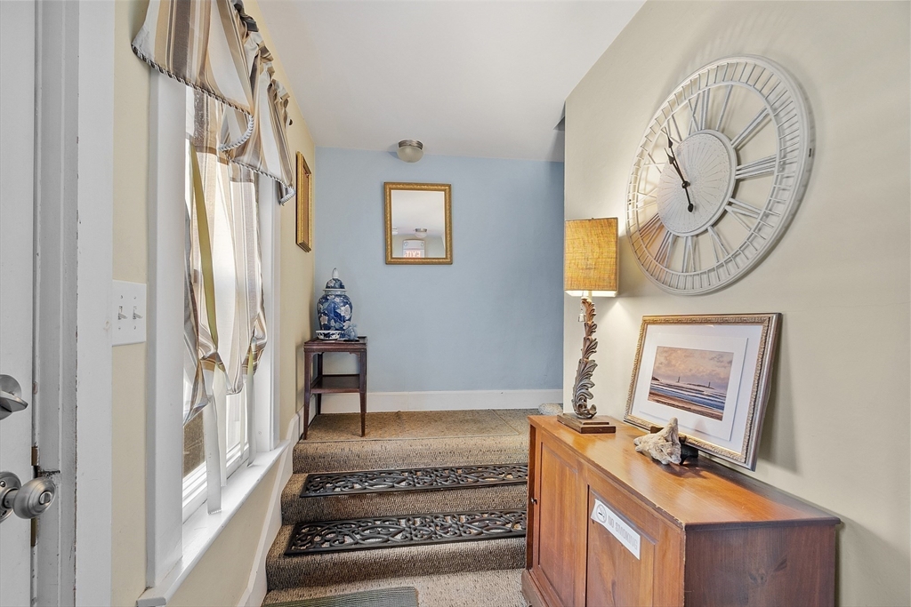 10 Oak Street, Unit 3 Gloucester, MA 01930 - Photo 6 of 24 a bathroom with a mirror a sink and a window