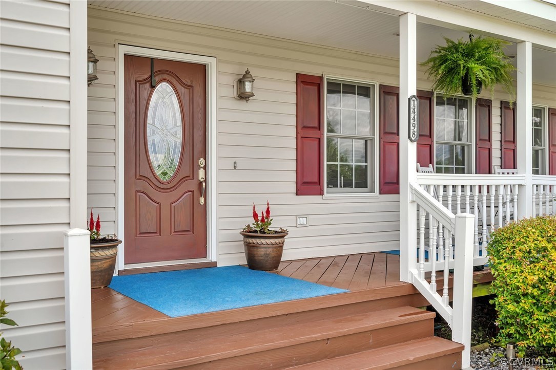 14498 Scotts Lane Carson, VA 23830 - Photo 2 of 44 a view of a house with entryway and wooden floor