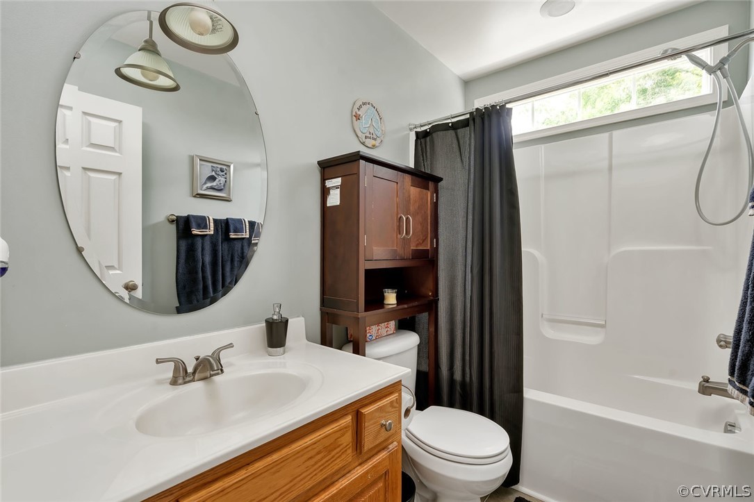 14498 Scotts Lane Carson, VA 23830 - Photo 24 of 44 a bathroom with a sink toilet and shower