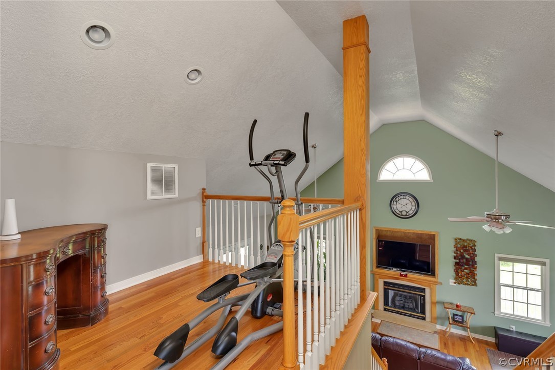 14498 Scotts Lane Carson, VA 23830 - Photo 25 of 44 a view of a staircase and a fireplace