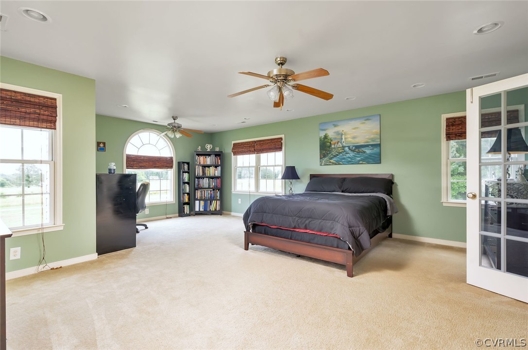 14498 Scotts Lane Carson, VA 23830 - Photo 26 of 44 a bedroom with a bed closet and window